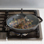 12 Inch Tempered Glass Pot Lid Compatible with 12” Lodge Cast Iron Skillets and 7 Quart Dutch Ovens - Designed with Steam Vent Hole and Heat Resistant Handle